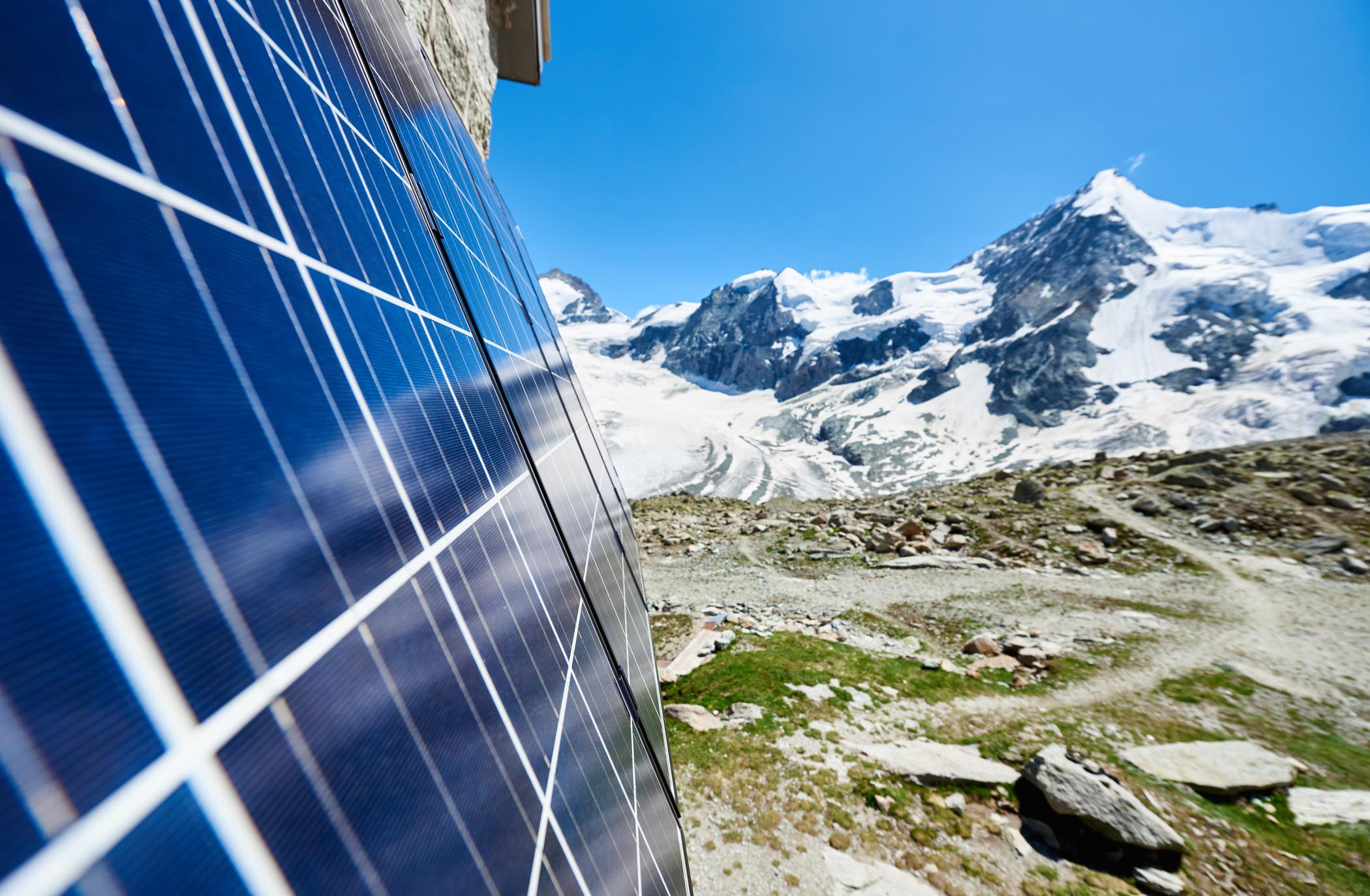 Grand Mountet Hut with solar batteries on the wall on a beautifu